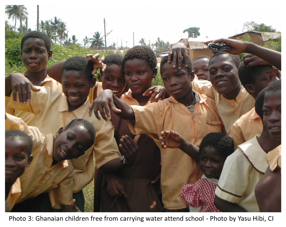 Photo 3: Ghanaian children free from carrying water attend school - Photo by Yasu Hibi, CI